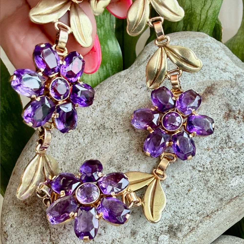 Sold.     
14 karat gold, and amethyst flower bracelet